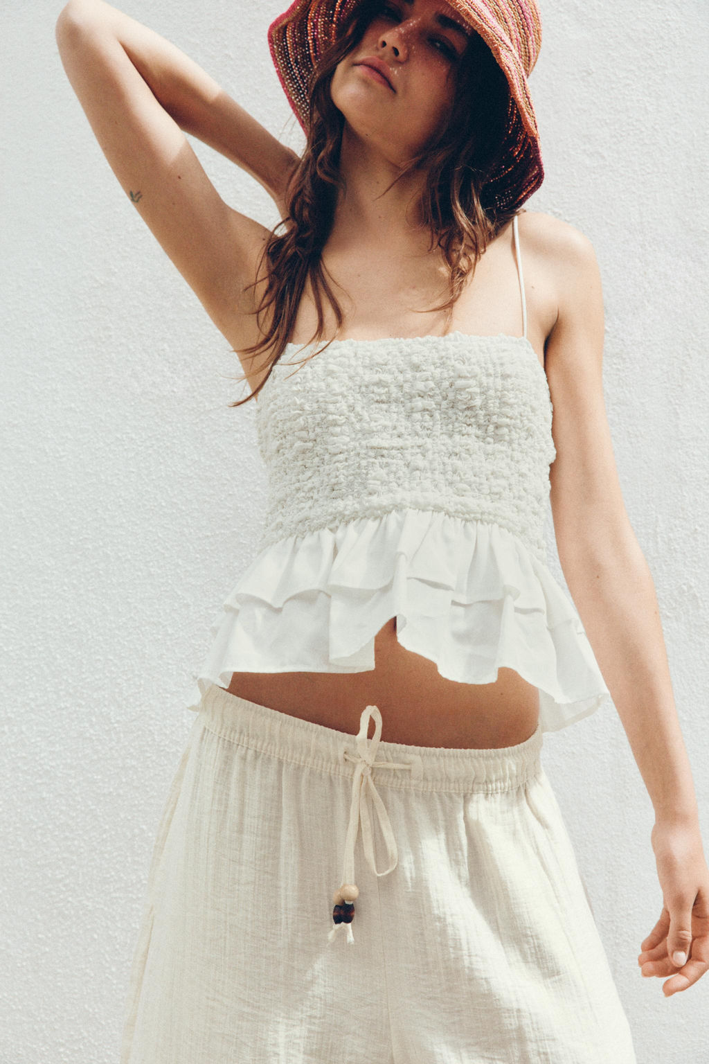 TOP NIDO DE ABEJA PEPLUM / Blanco