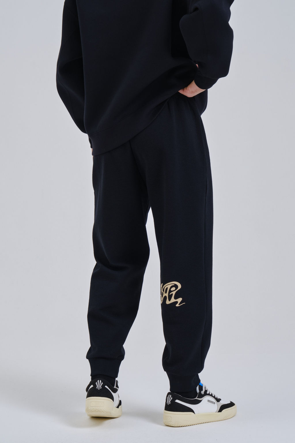 Брюки трикотажные Черный NATURAL POWER Knit Track Pants - Anta фото 3