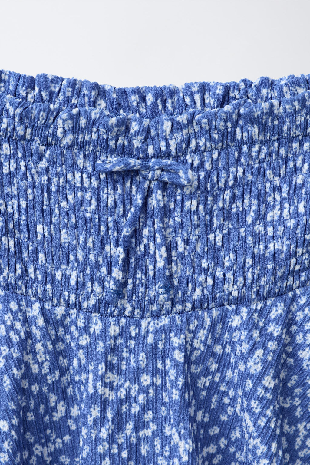 FLORAL LAYERED BERMUDA SKORT