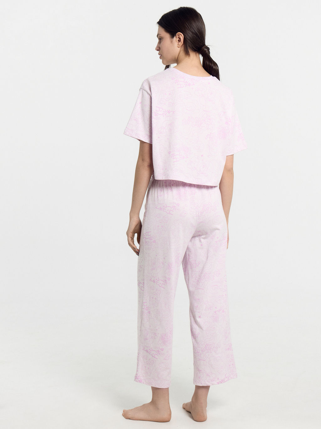 Комплект женский (футболка, бриджи) фиолетовый с принтом "комиксы"