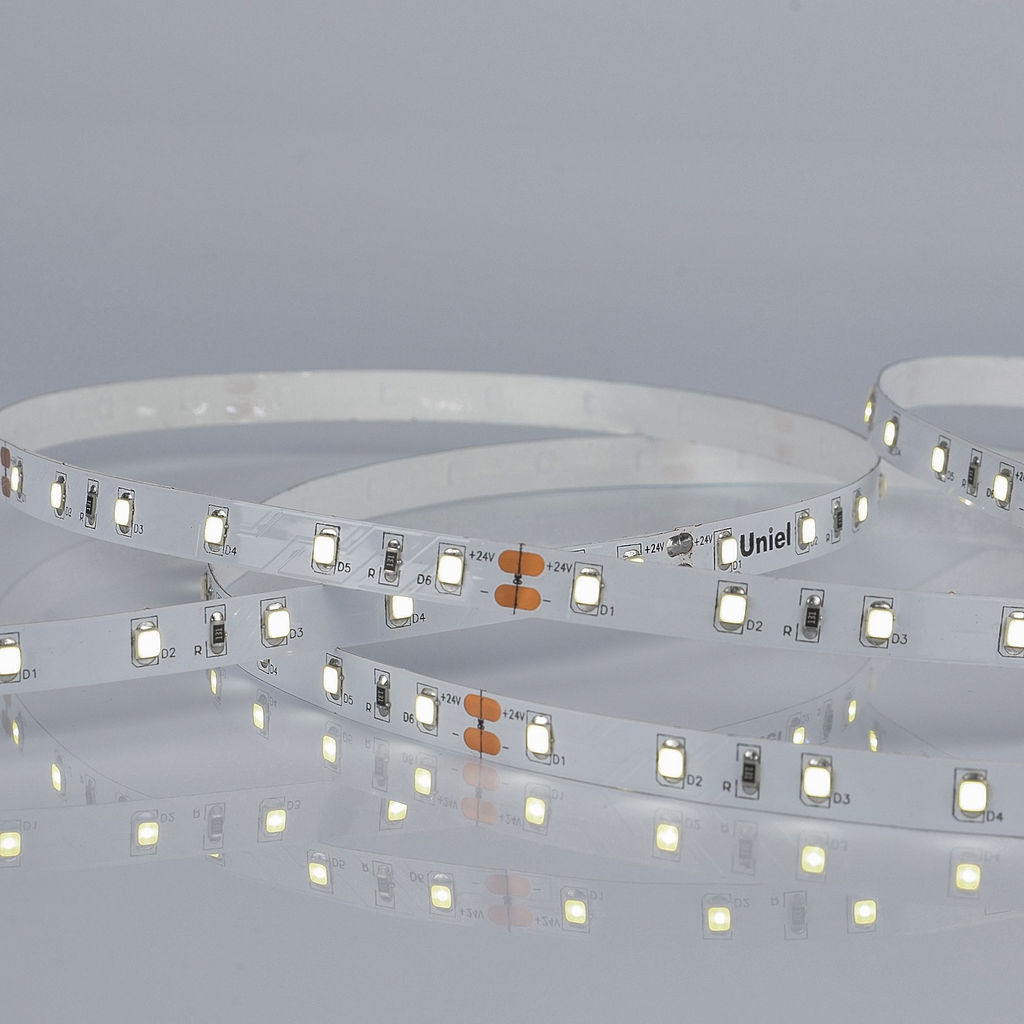 ULS-2835-60LED/m-8mm-IP20-DC24V-6W/m-5M-DW Гибкая светодиодная лента на самоклеящейся основе. Катушка 5 м. в герметичной упаковке. Дневной белый свет (6500K). ТМ Uniel.