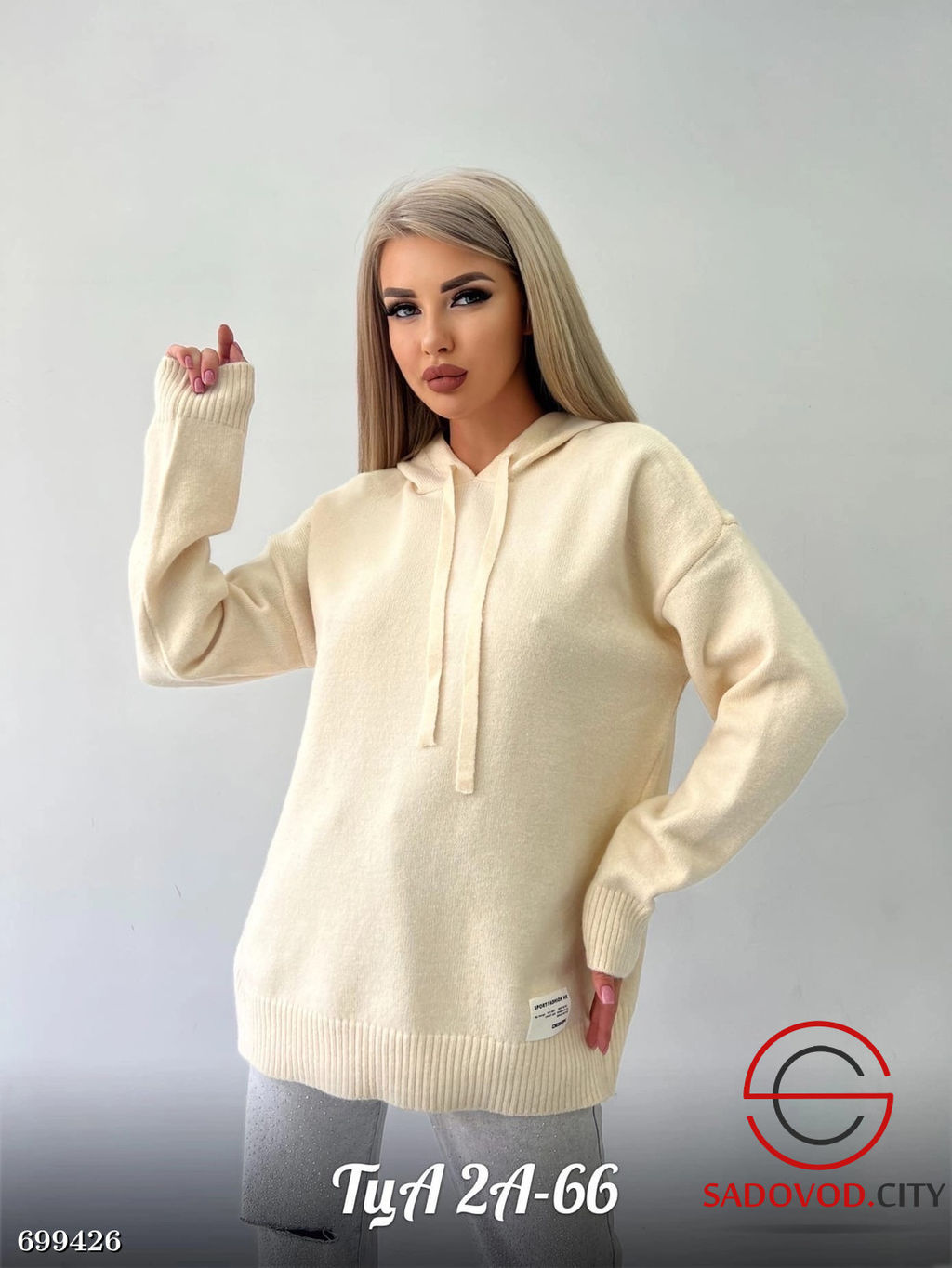 Женский удлиненный свитер