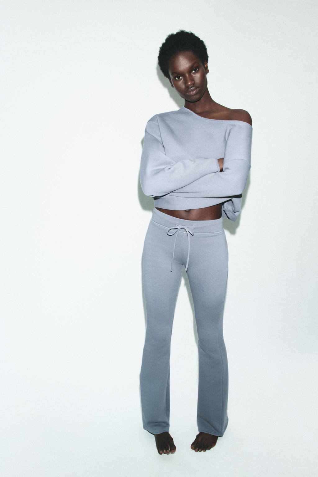 WASHED-EFFECT FLARE TROUSERS - Zara фото 7