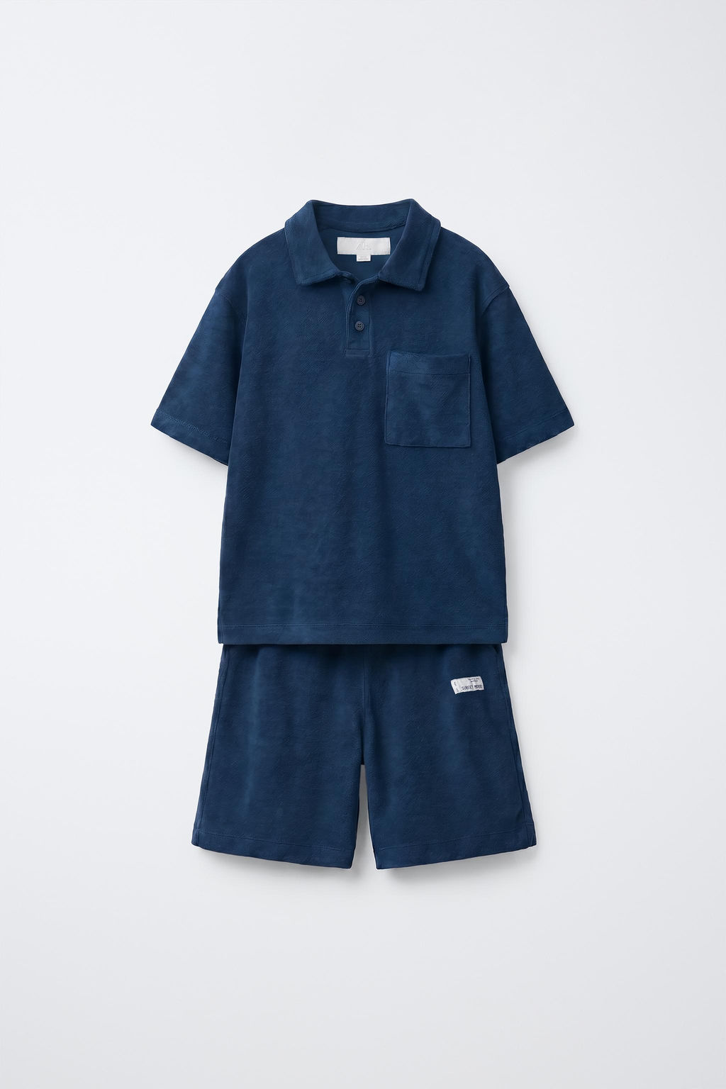 CONJUNTO POLO Y BERMUDA EFECTO TOALLA / Azul