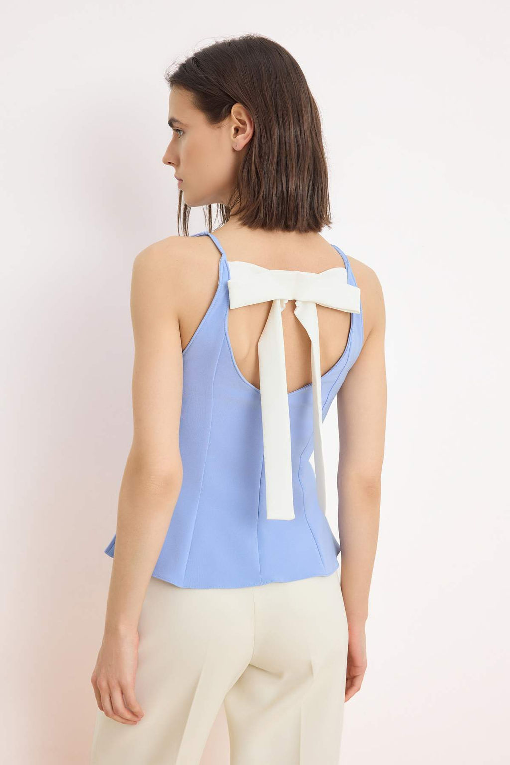 Mavi S?rt? Fiyonk Detayl? Peplum Dokuma Bluz TPRSS26BZ00045 - Trendyolmilla фото 5