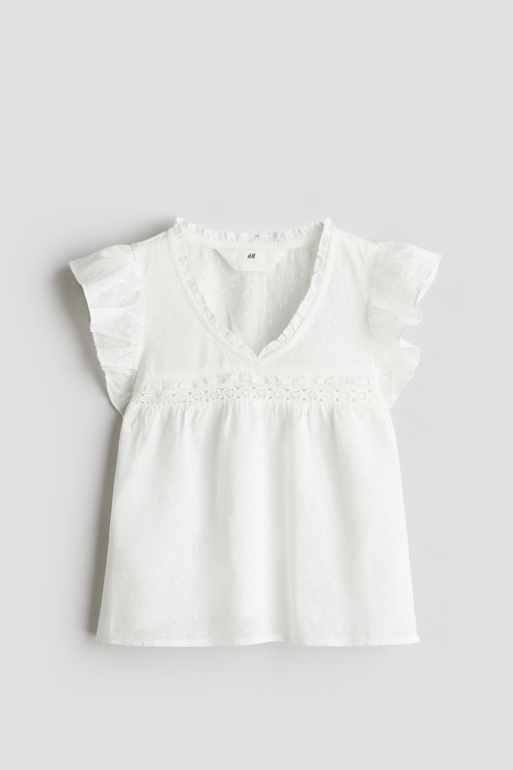 Blusa de algod?n con ribetes de volante