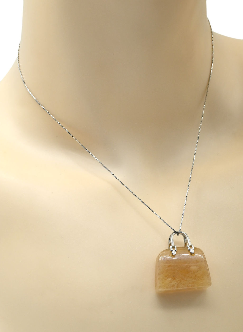 Оригинальная подвеска с халцедоном в форме сумочки 25*10*27мм цв.желтый.