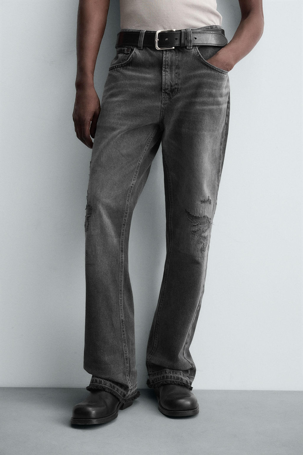 RIPPED BELL BOTTOM FIT JEANS