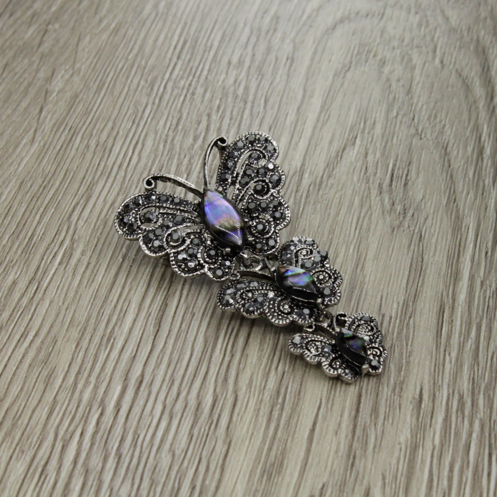Брошь-подвеска "Бабочки" со вставкой из гелиотиса