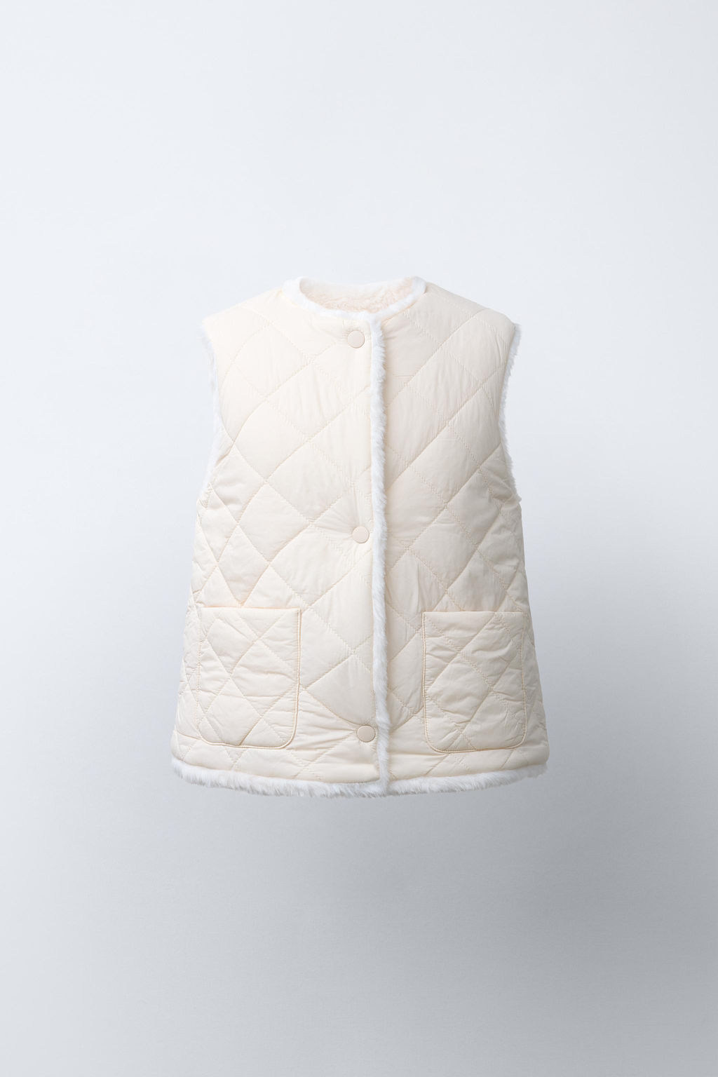 REVERSIBLE FAUX FUR GILET