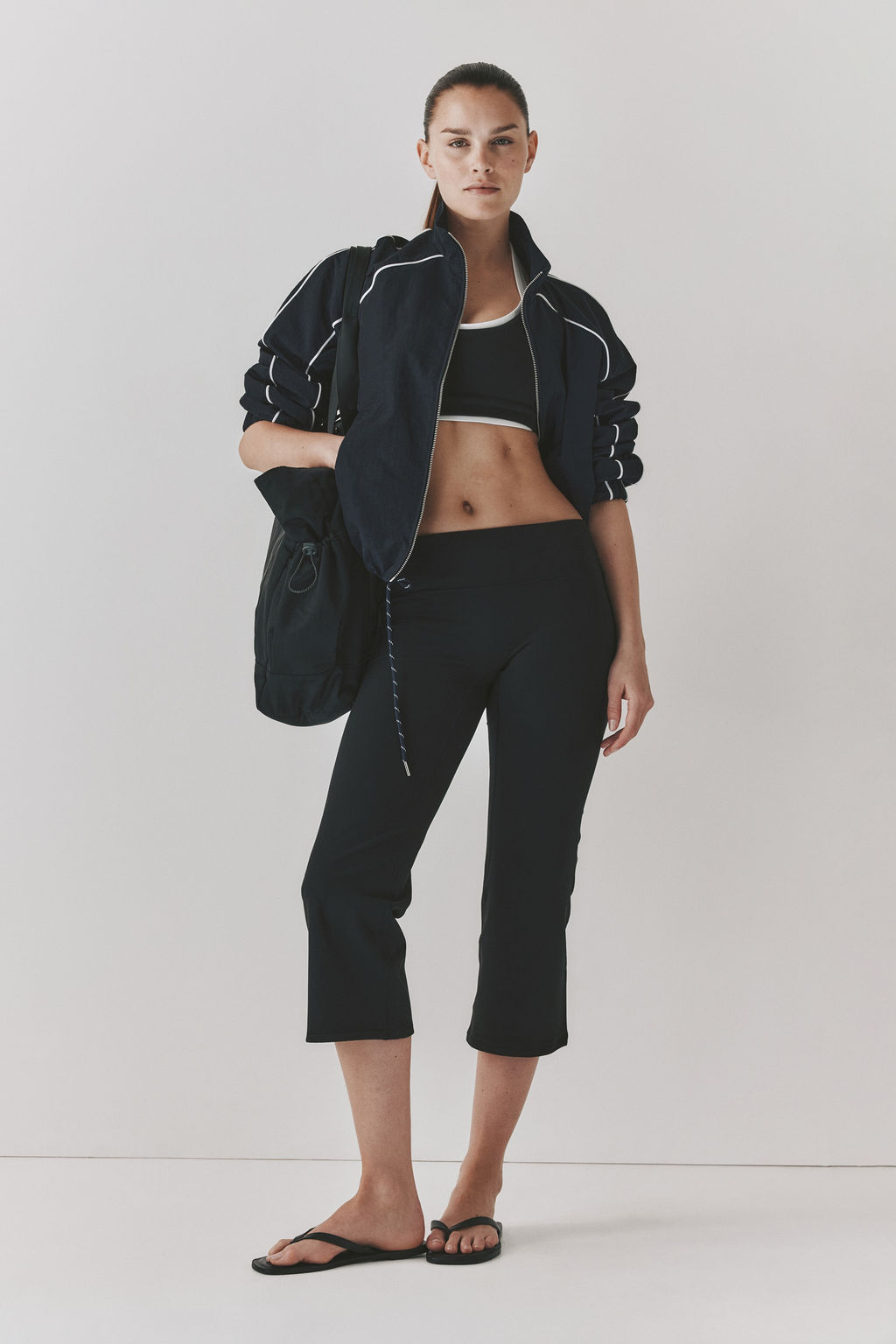 Leggings capri de deporte con SoftMove Flared - H&m фото 4