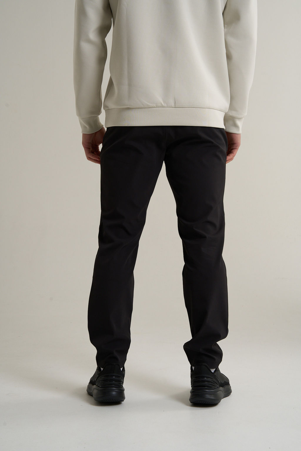 Брюки текстильные Черный TRN Woven Track Pants - Anta фото 5