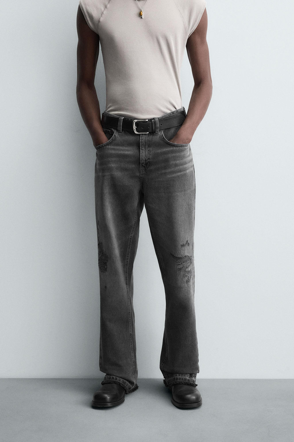 RIPPED BELL BOTTOM FIT JEANS