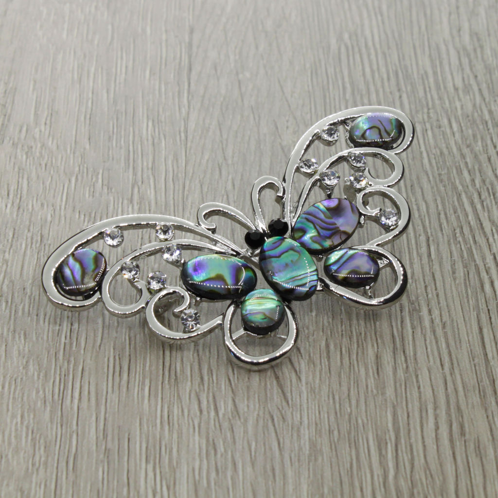 Брошь "Бабочка" со вставками из гелиотиса и ювелирного сплава
