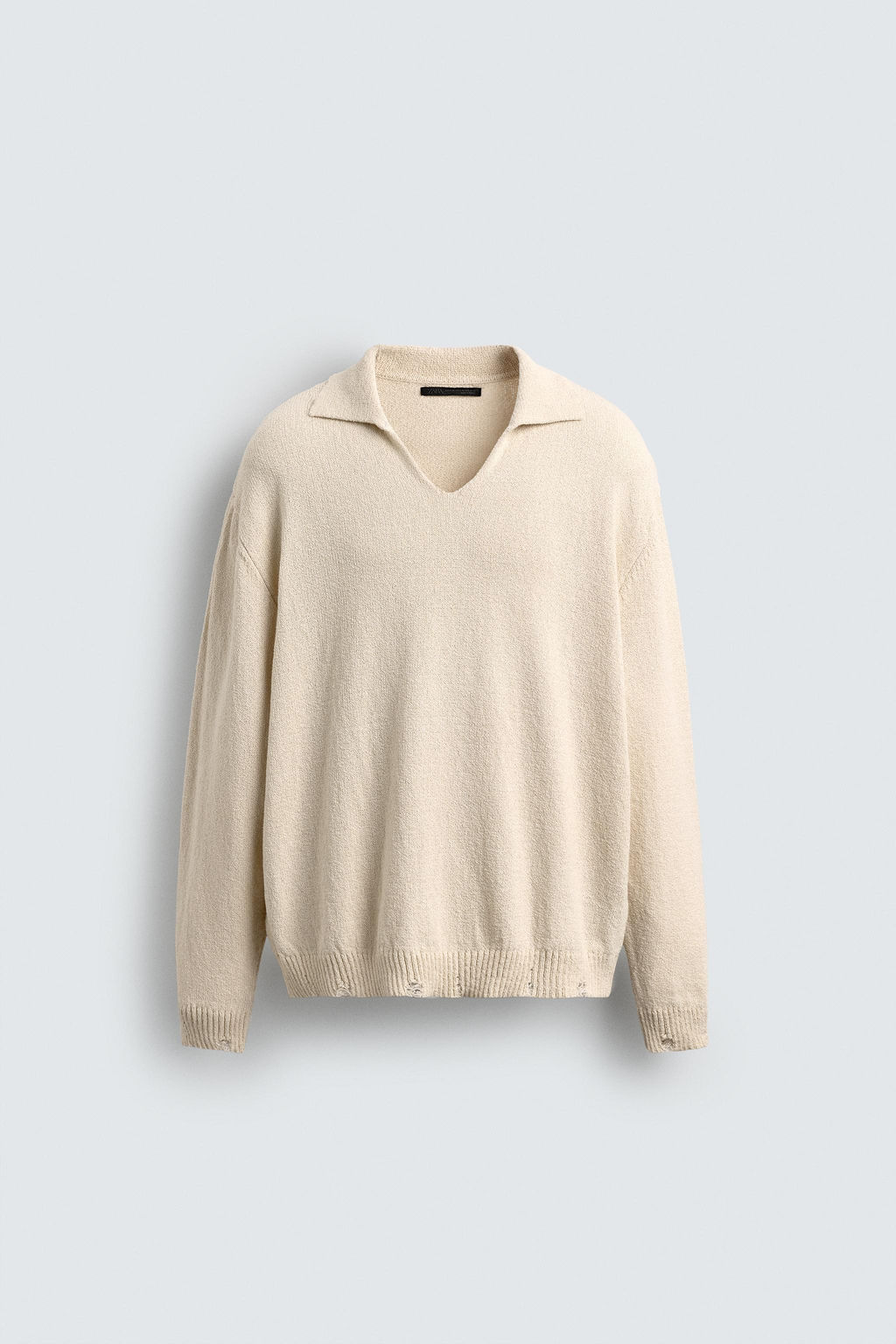 KNITTED RIPPED-EFFECT POLO SHIRT
