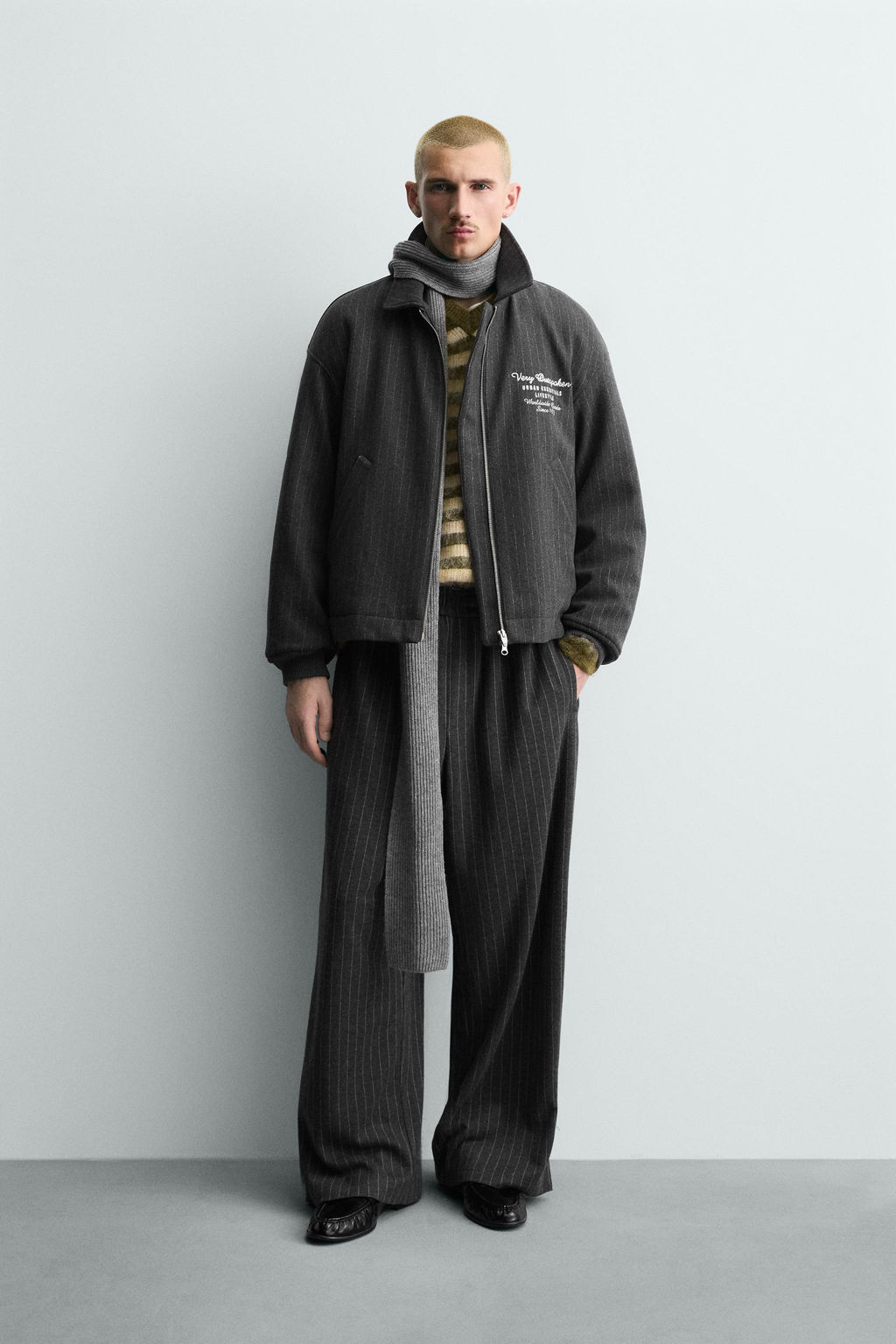 STRIPED BAGGY FIT TROUSERS