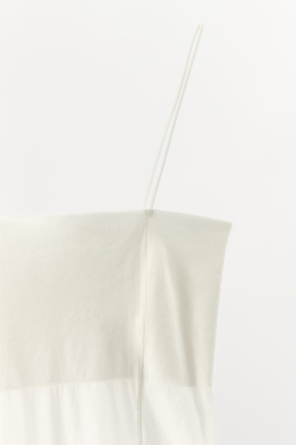 FITTED BODYSUIT WITH STITCHING