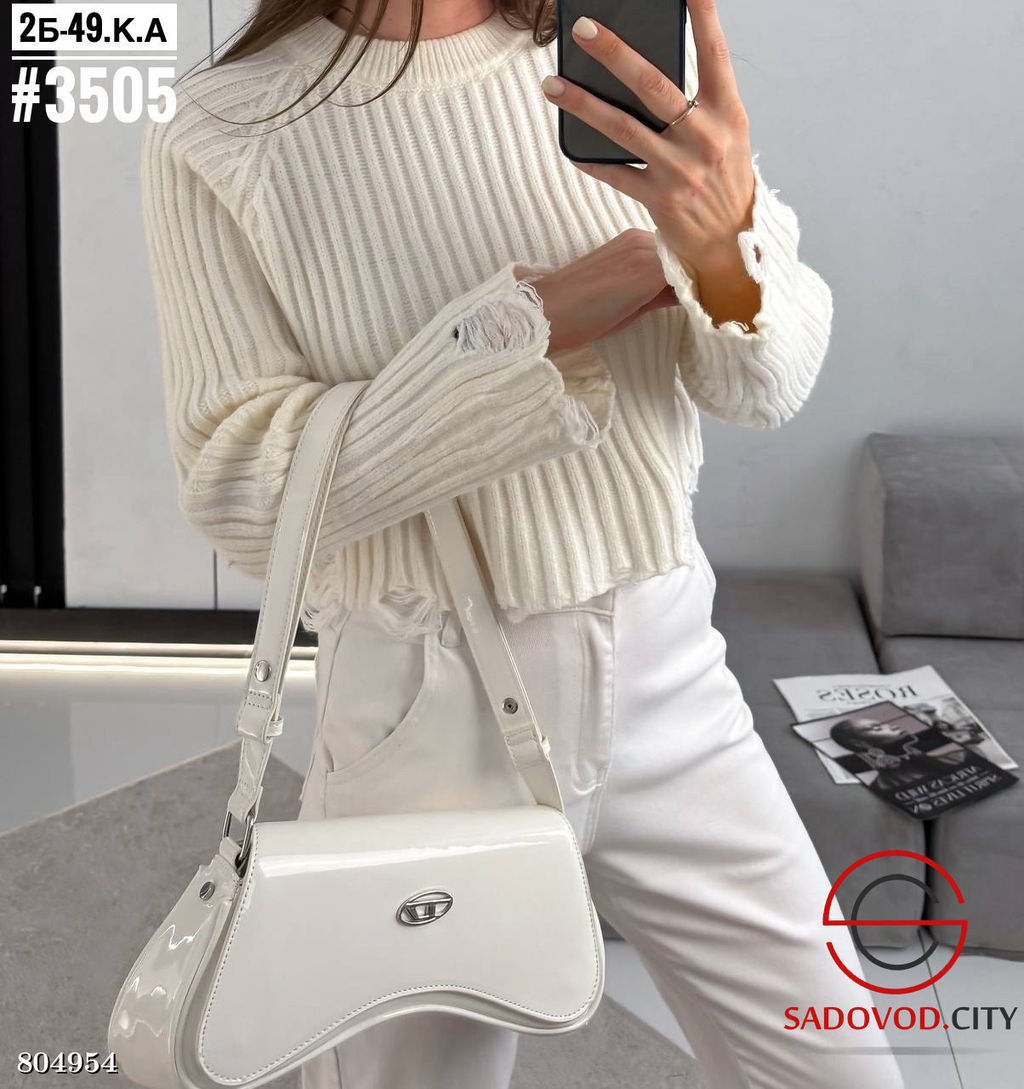 Свитер женский с рваным эффектом