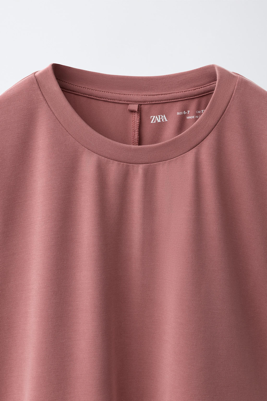 CAMISETA FLUIDA GYM CON MODAL / Rosa empolvado