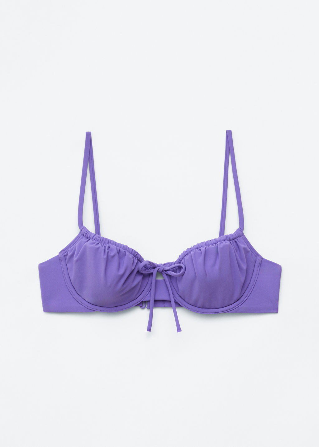 Top de bikini con aros y detalle de lazo