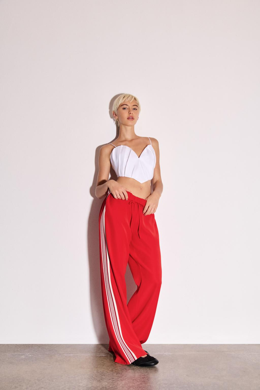 TROUSERS WITH SIDE TAPING