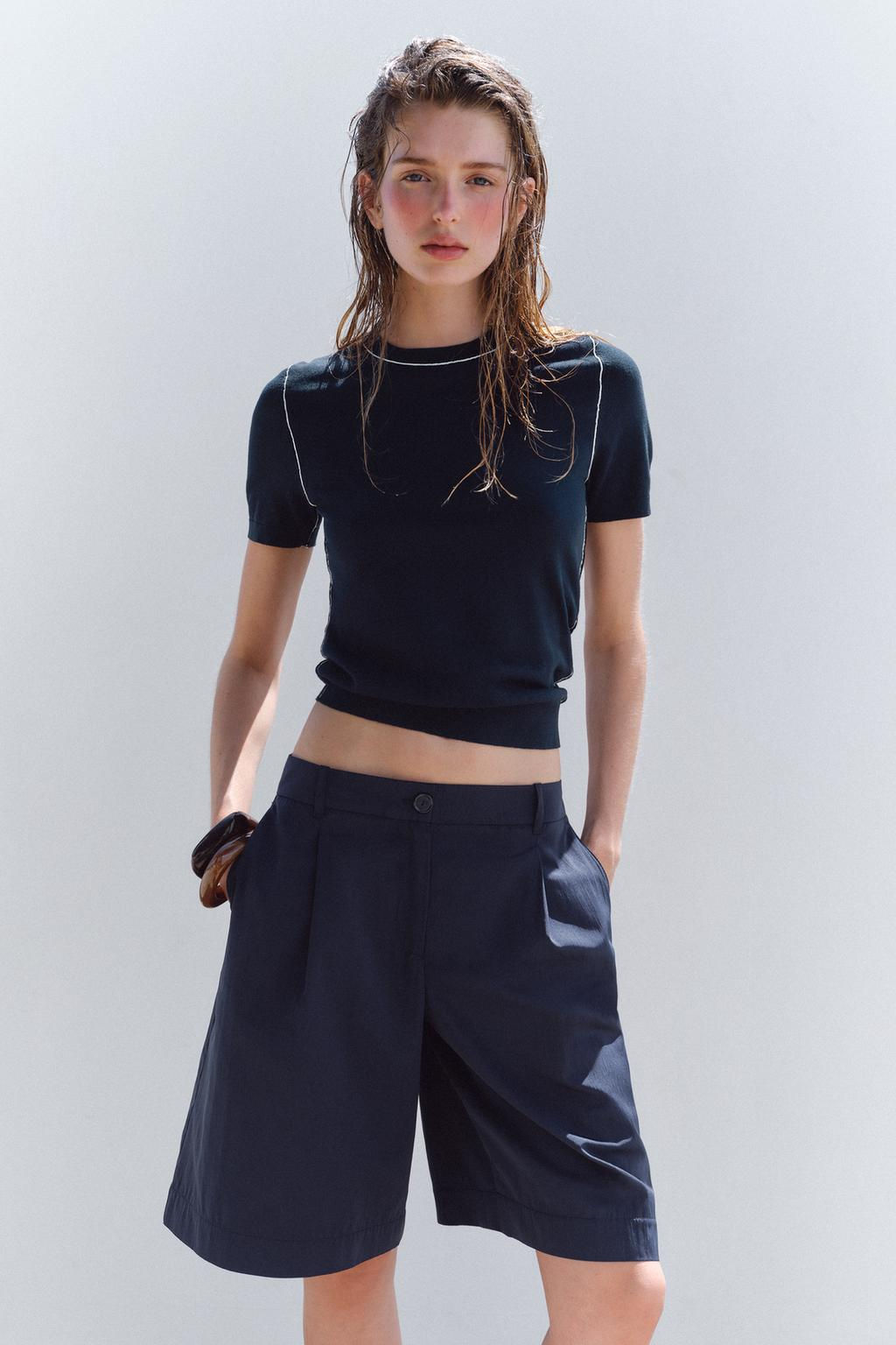 SHORT SLEEVE KNIT TOP WITH PIPING
