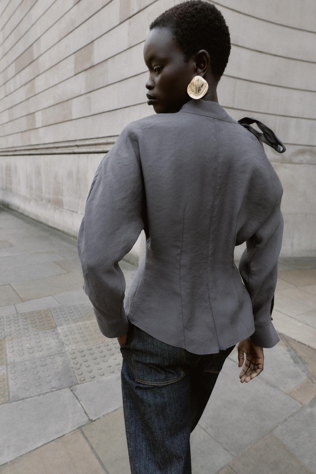 BLOUSE WITH SHOULDER OPENING AND BOW