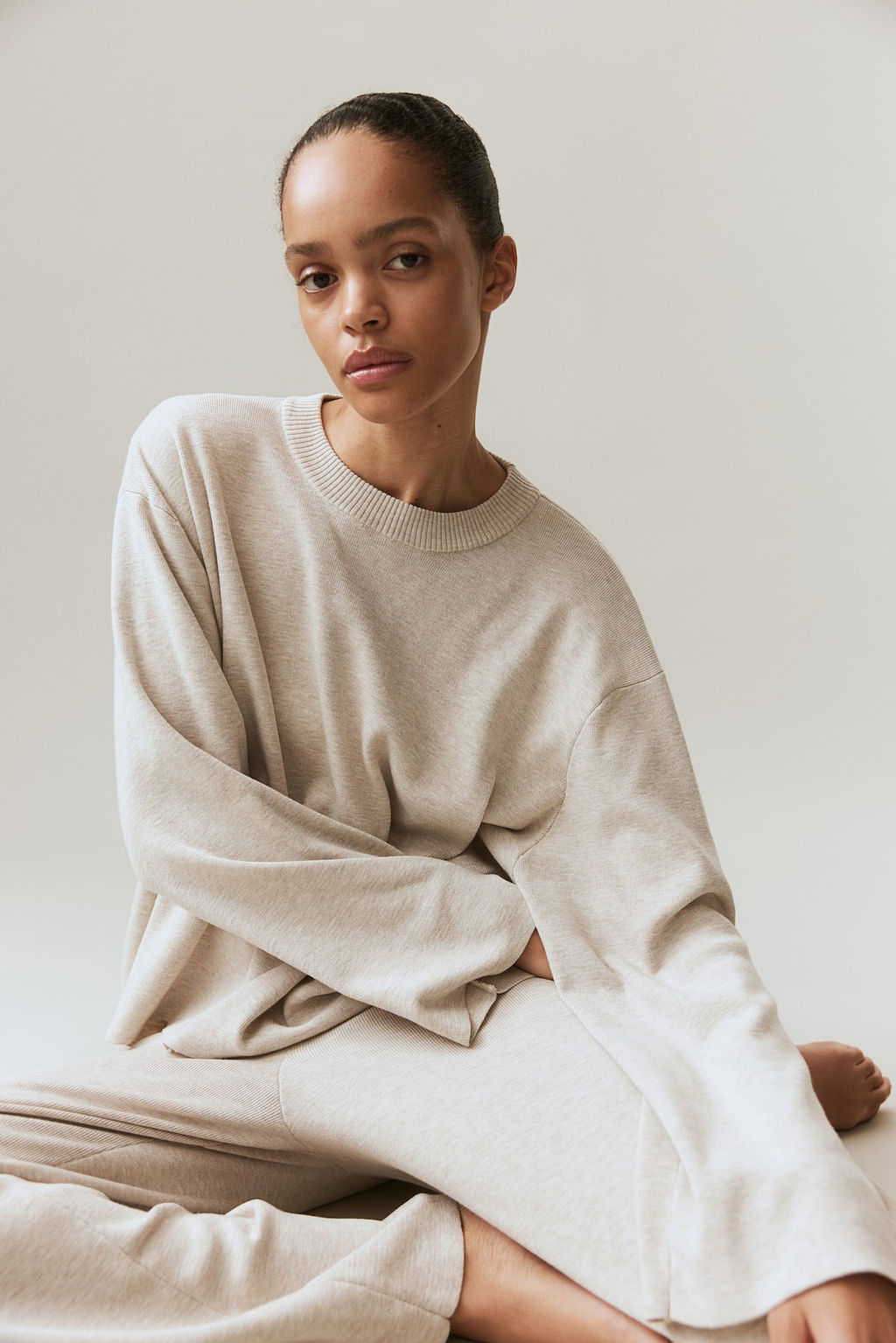 Jersey oversize con bajo redondeado