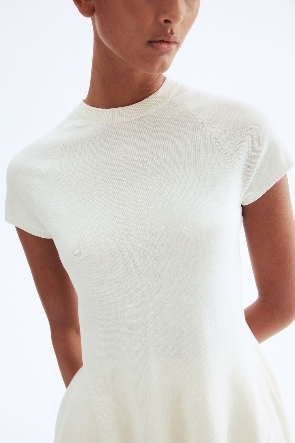 Top en punto fino con peplum - H&m фото 7