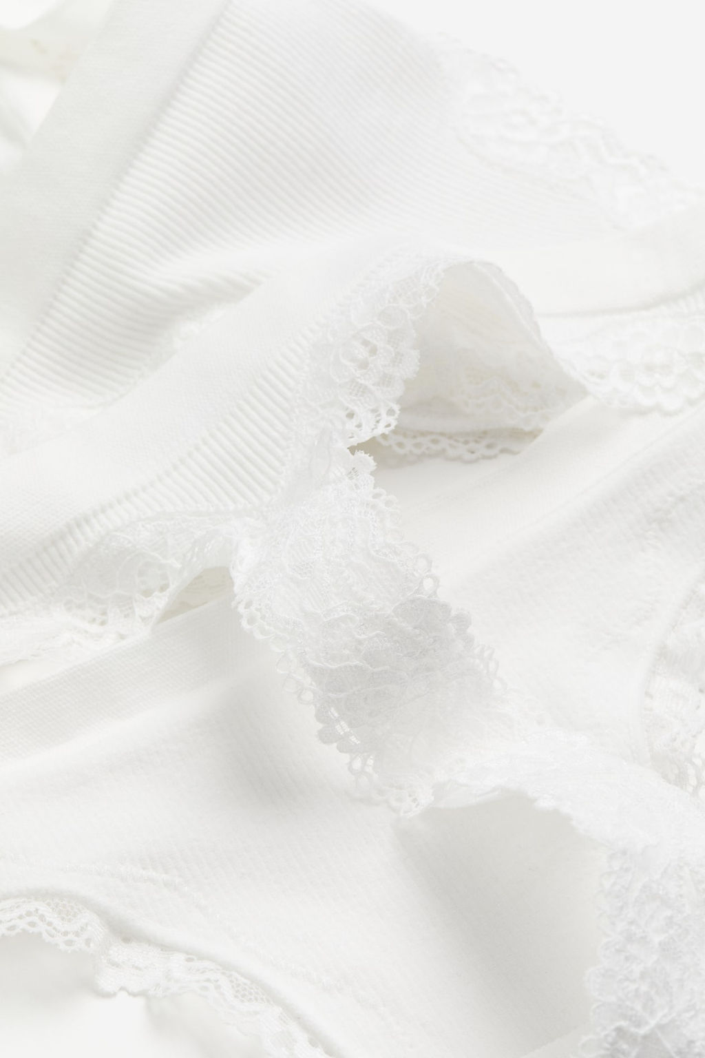 Pack 2 bragas Thong con ribete de encaje Seamless - H&m фото 7