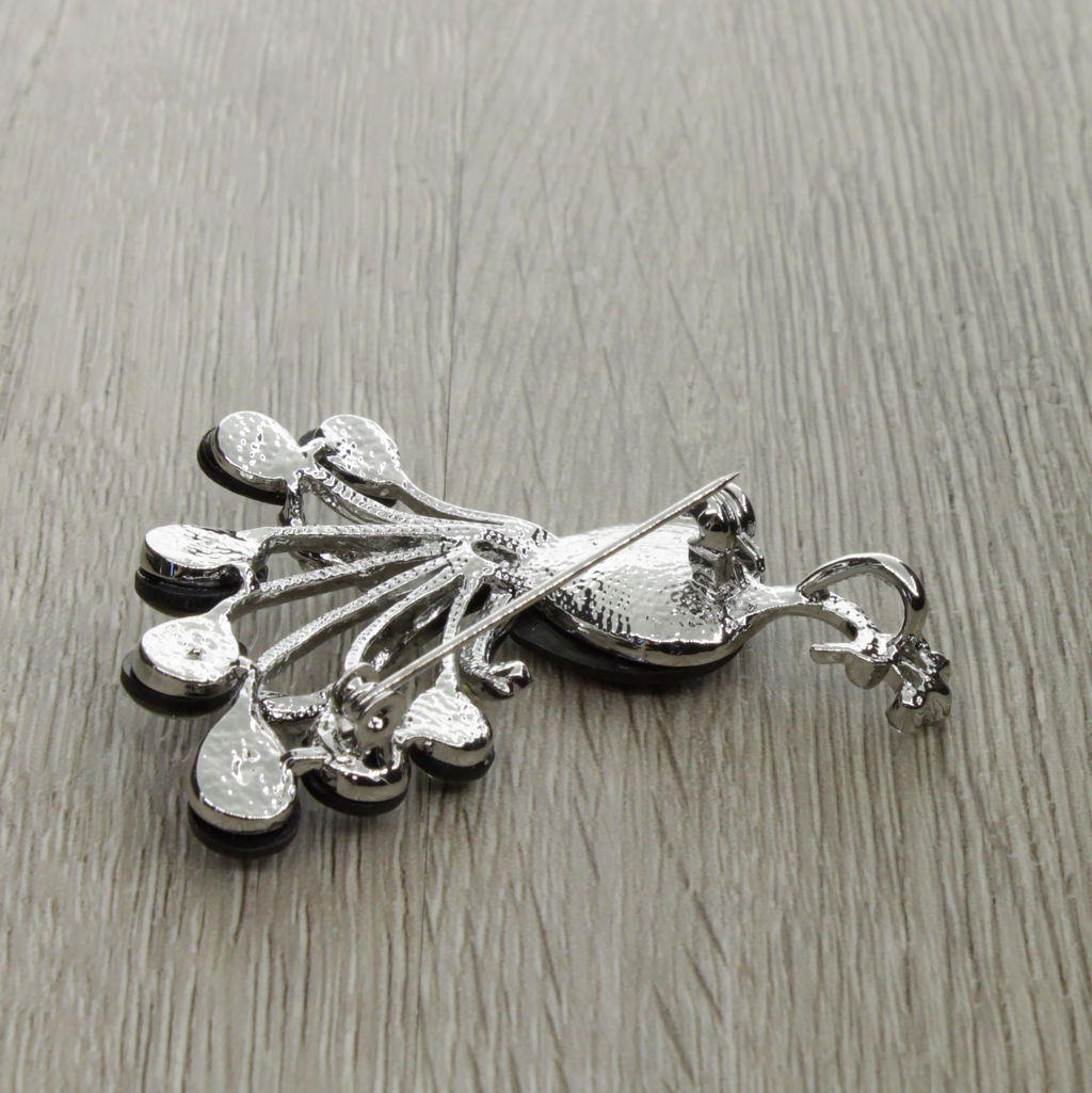 Брошь-подвеска "Жар-птица" со вставками из гелиотиса и ювелирного сплава