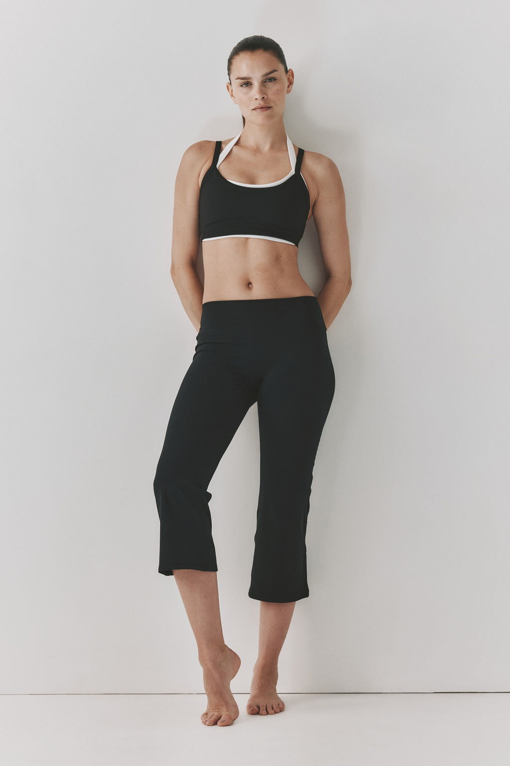 Leggings capri de deporte con SoftMove Flared - H&m фото 3