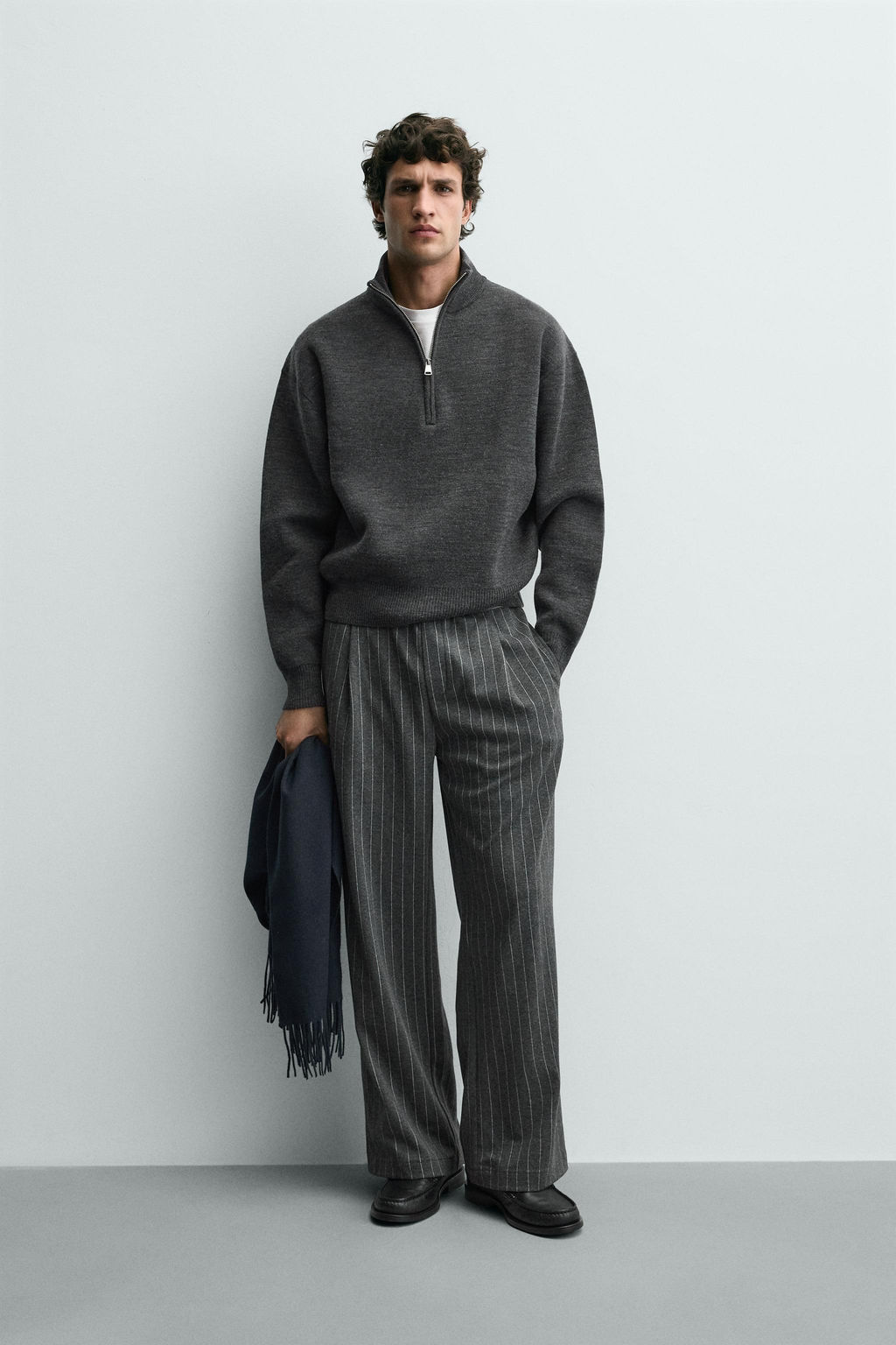 PINSTRIPED PLEATED TROUSERS