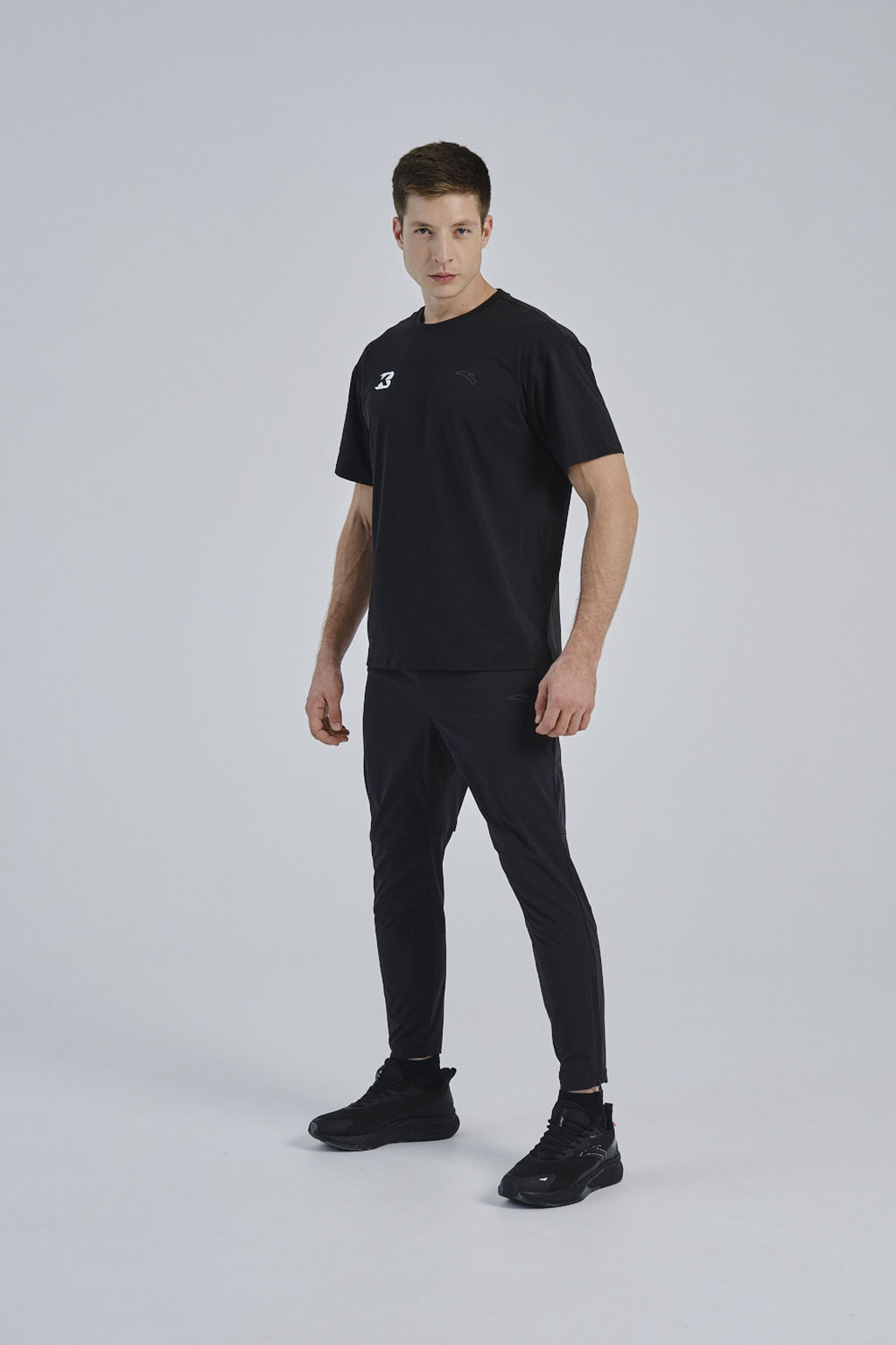 Брюки текстильные укороченные Черный RACING CHALLENGE Woven Ankle Pants - Anta фото 2