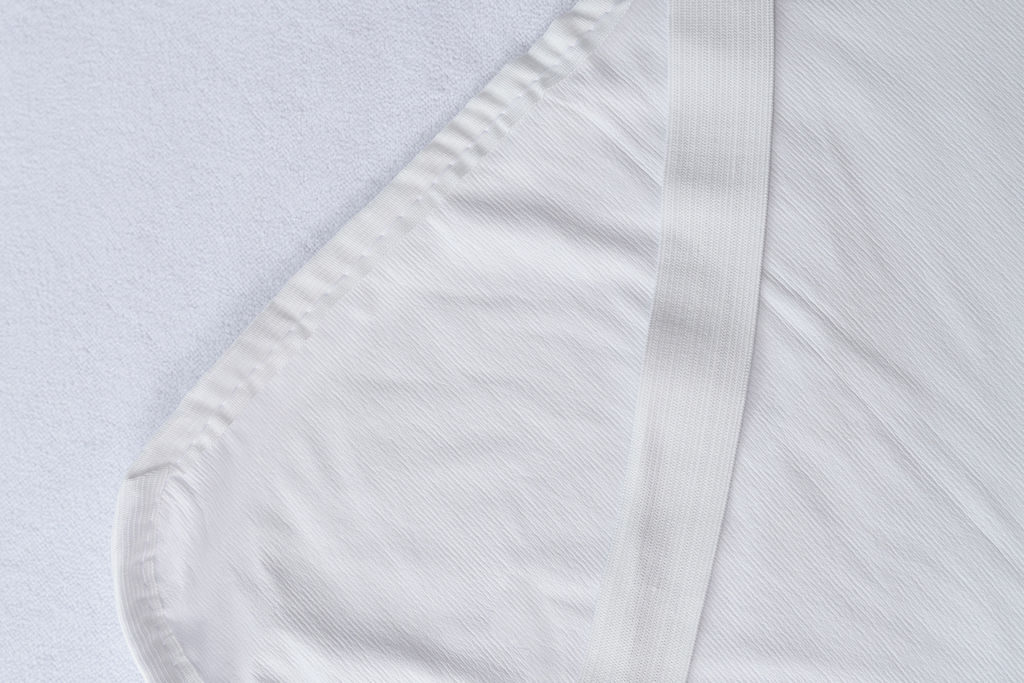 Наматрасник Комфорт с резинкой по углам