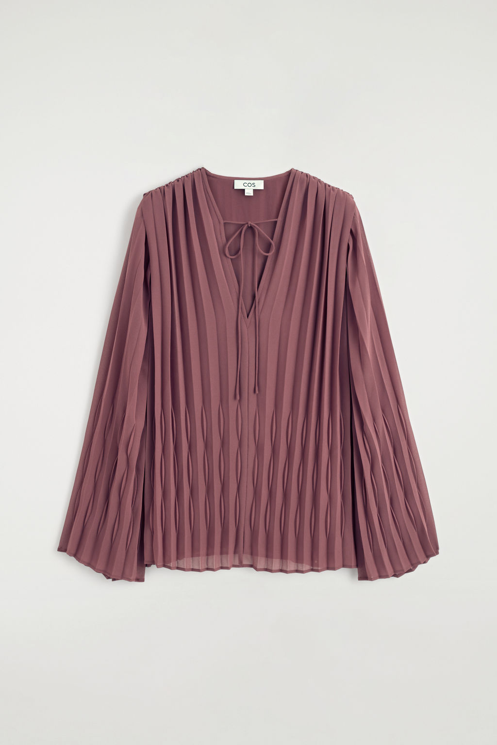 BLUSA PLISADA CON LAZO FRONTAL