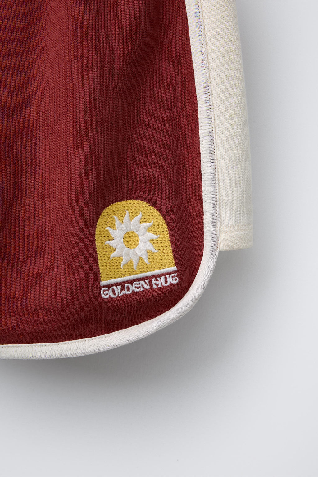 EMBROIDERED PLUSH BERMUDA SHORTS