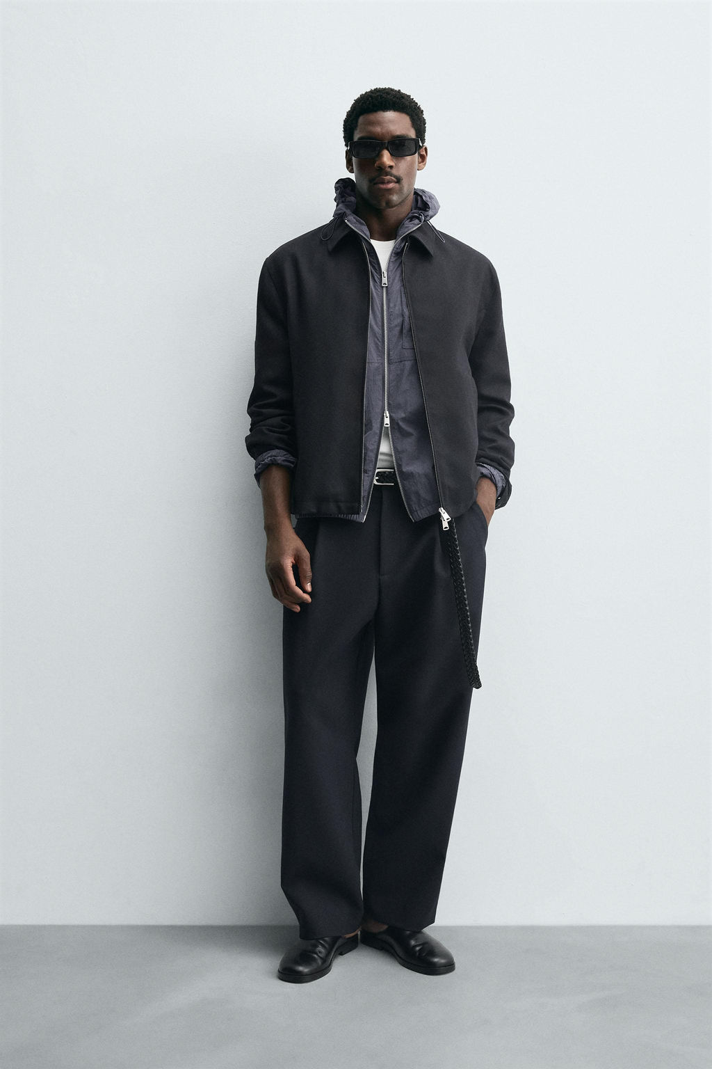 RELAXED FIT PLEATED TROUSERS