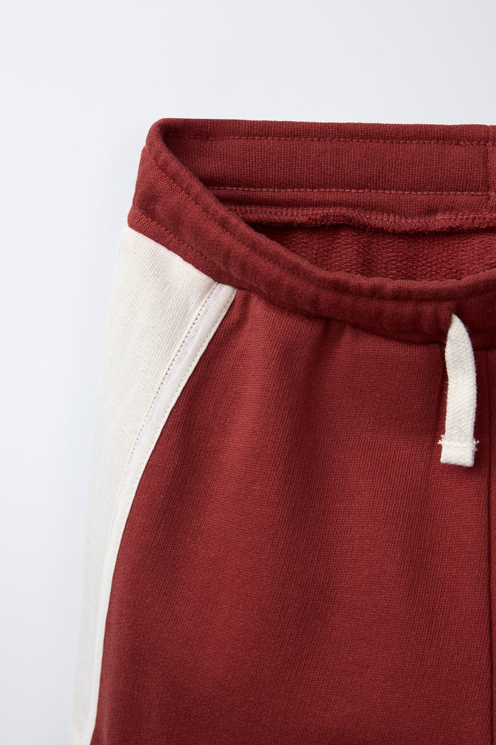 EMBROIDERED PLUSH BERMUDA SHORTS