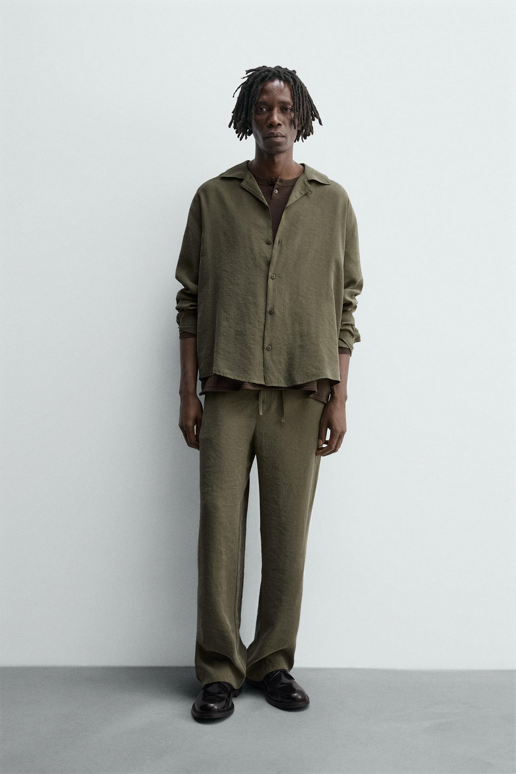 RELAXED FIT FLOWING TROUSERS