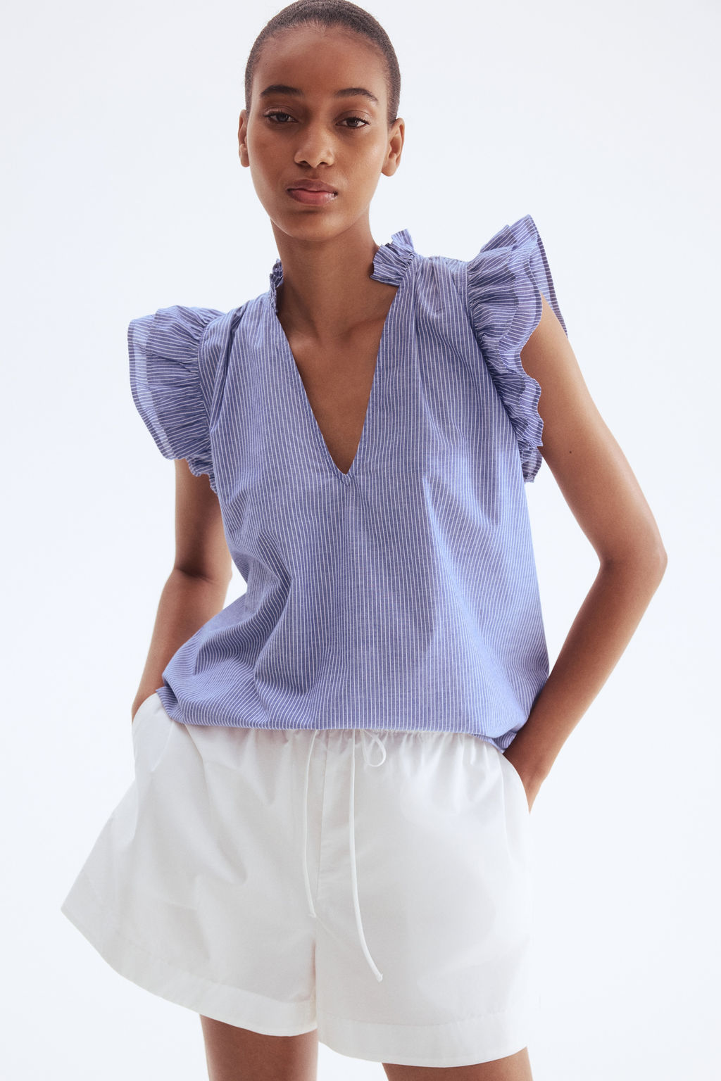 Blusa con ribetes de volante - H&m фото 5