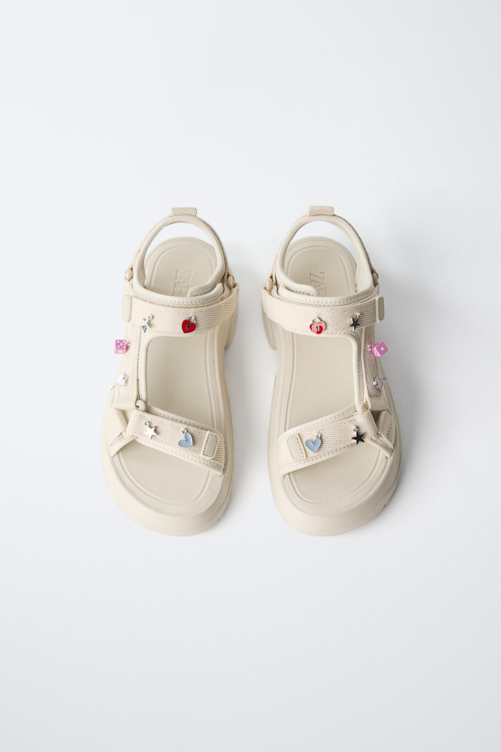 SANDALIA T?CNICA CHARMS / Blanco Crudo