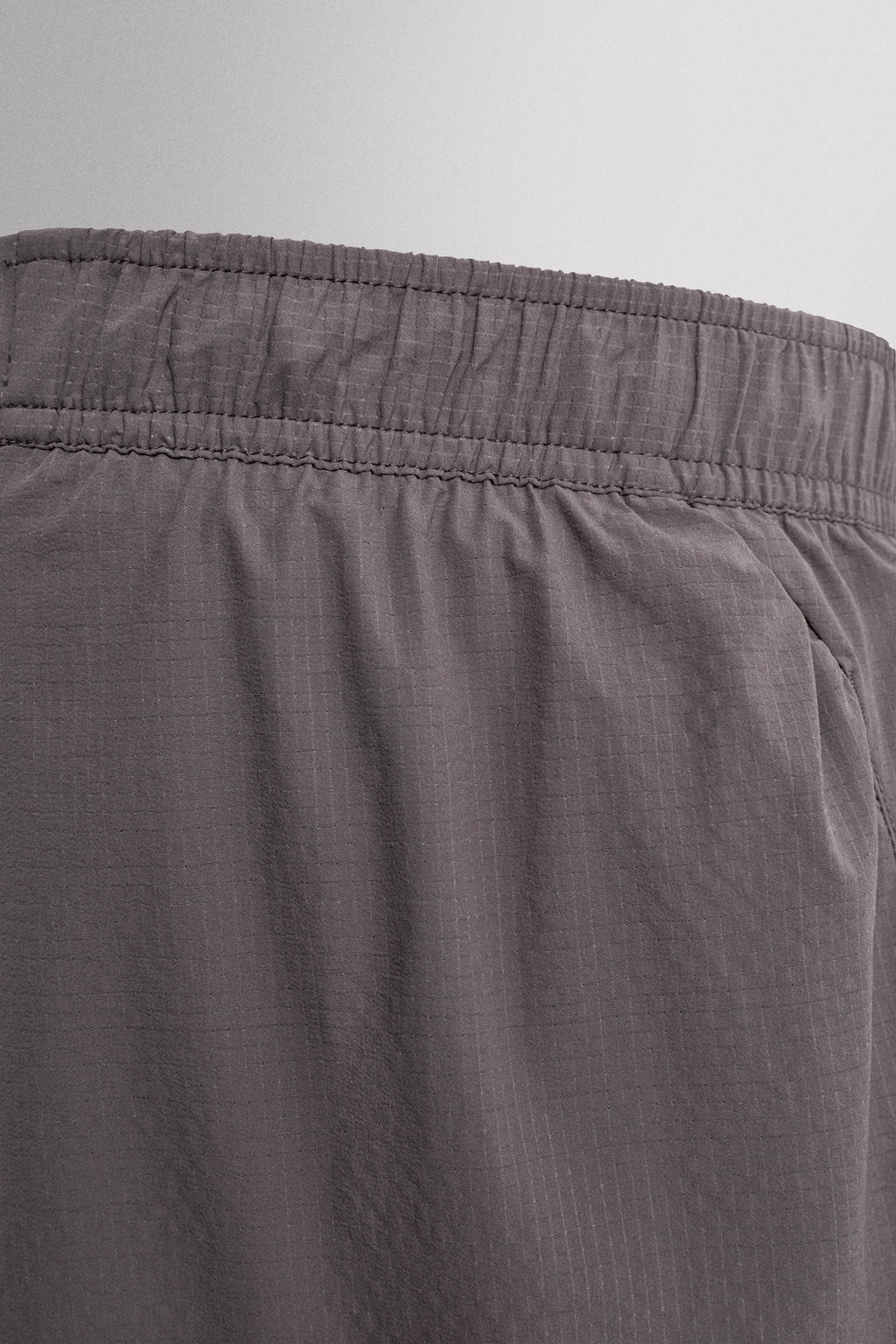PANTALONES CORTOS LIGEROS RUNNING 3" / Morado