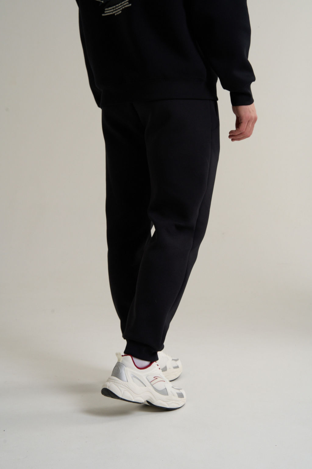 Брюки трикотажные Черный ANTA TRN Knit Track Pants фото 4