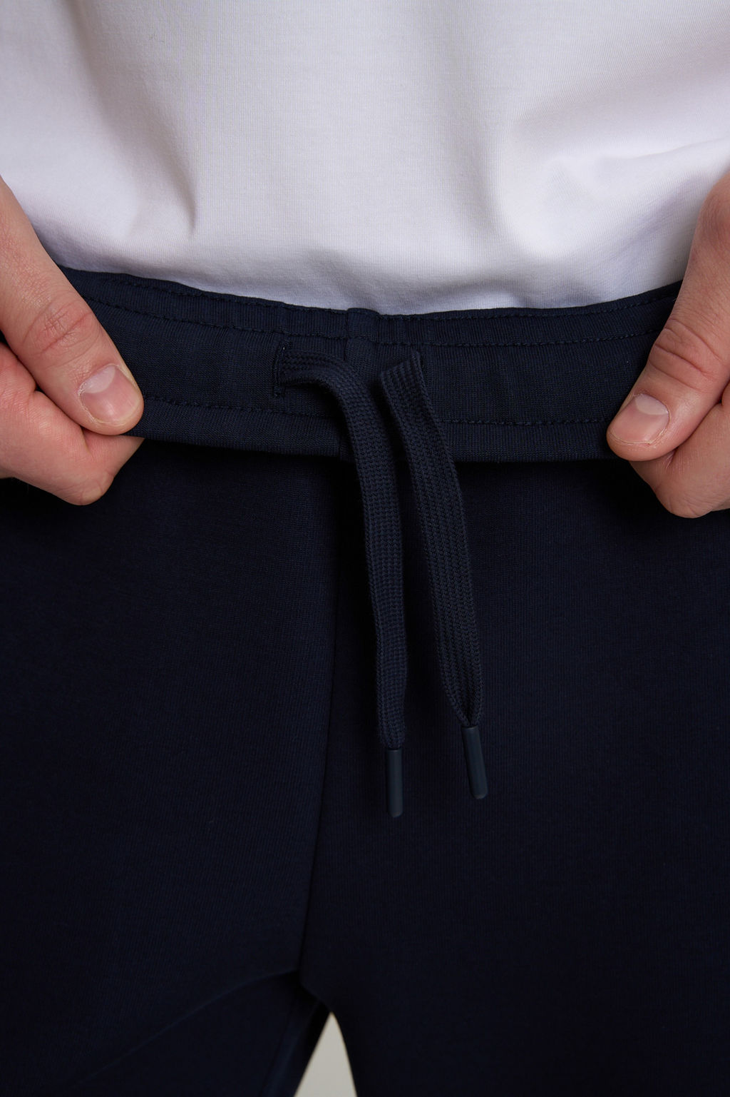 Брюки трикотажные Темно-синий TRN ESSENTIAL Knit Track Pants - Anta фото 9