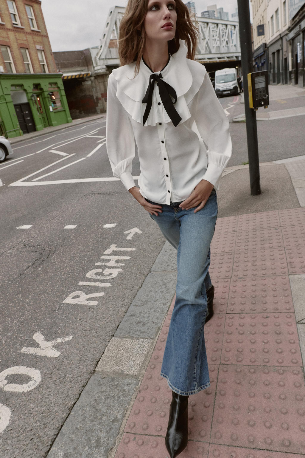 RUFFLED BLOUSE WITH CONTRAST BOW