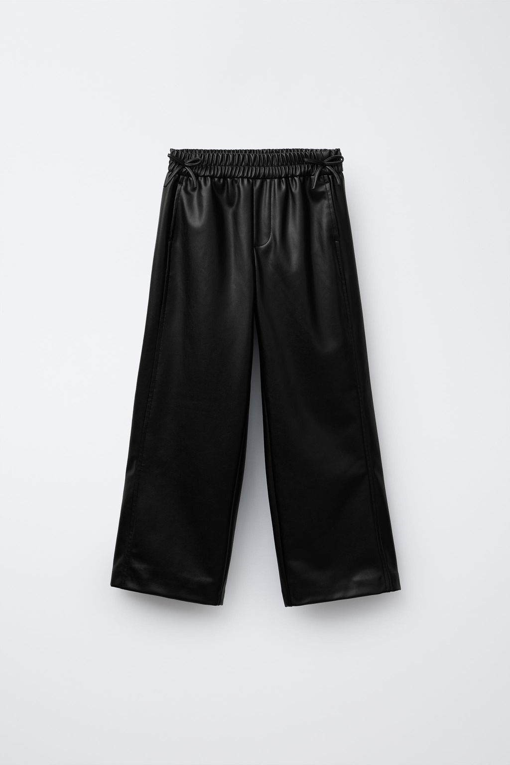 FAUX LEATHER TROUSERS WITH BOWS