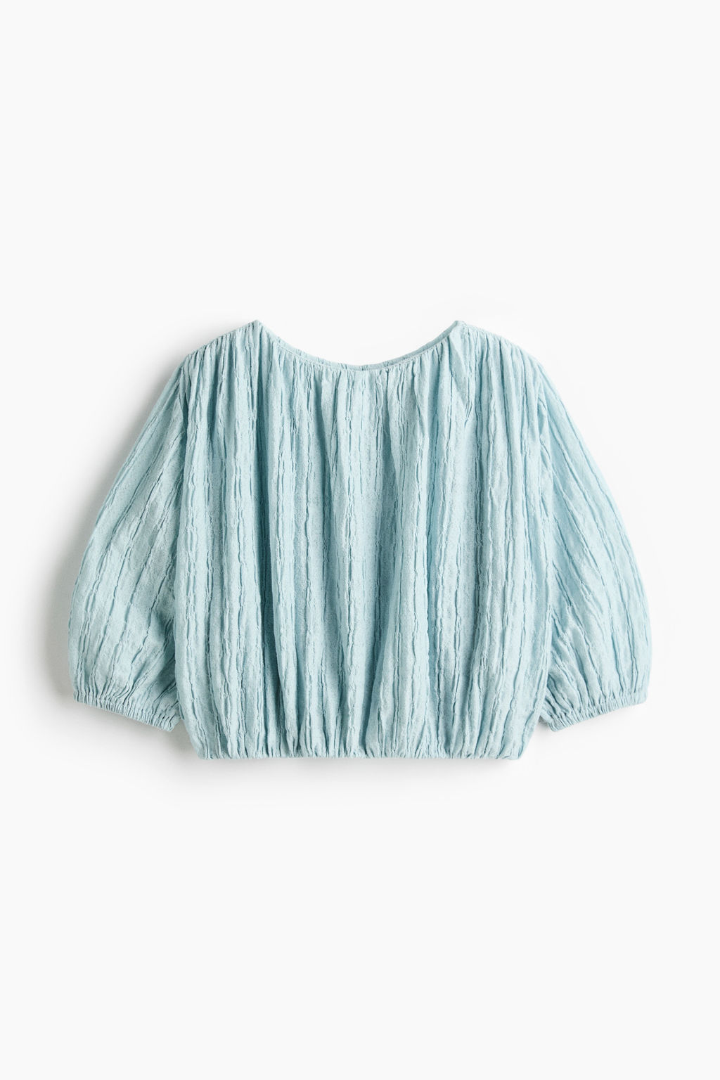 Blusa texturizada con bajo burbuja