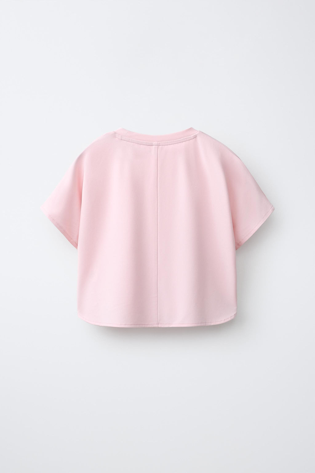 CAMISETA FLUIDA GYM CON MODAL / Rosa