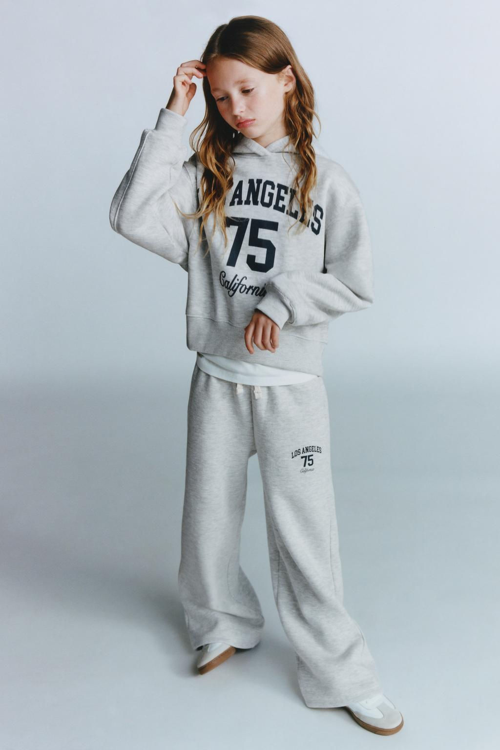 WIDE-LEG TROUSERS WITH SLOGAN